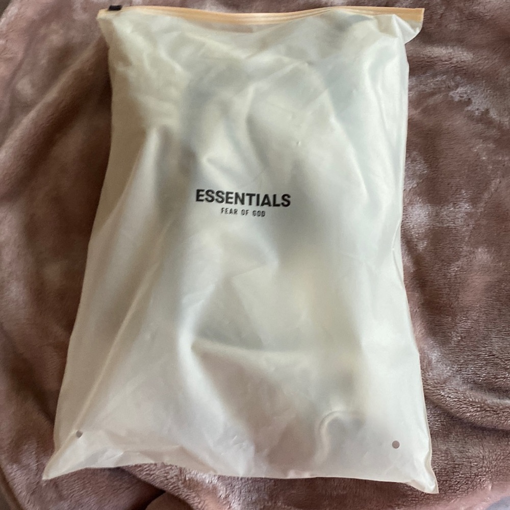 BRAND new KIDS essentials hoodie!!! Have not worn! Was too small for me.